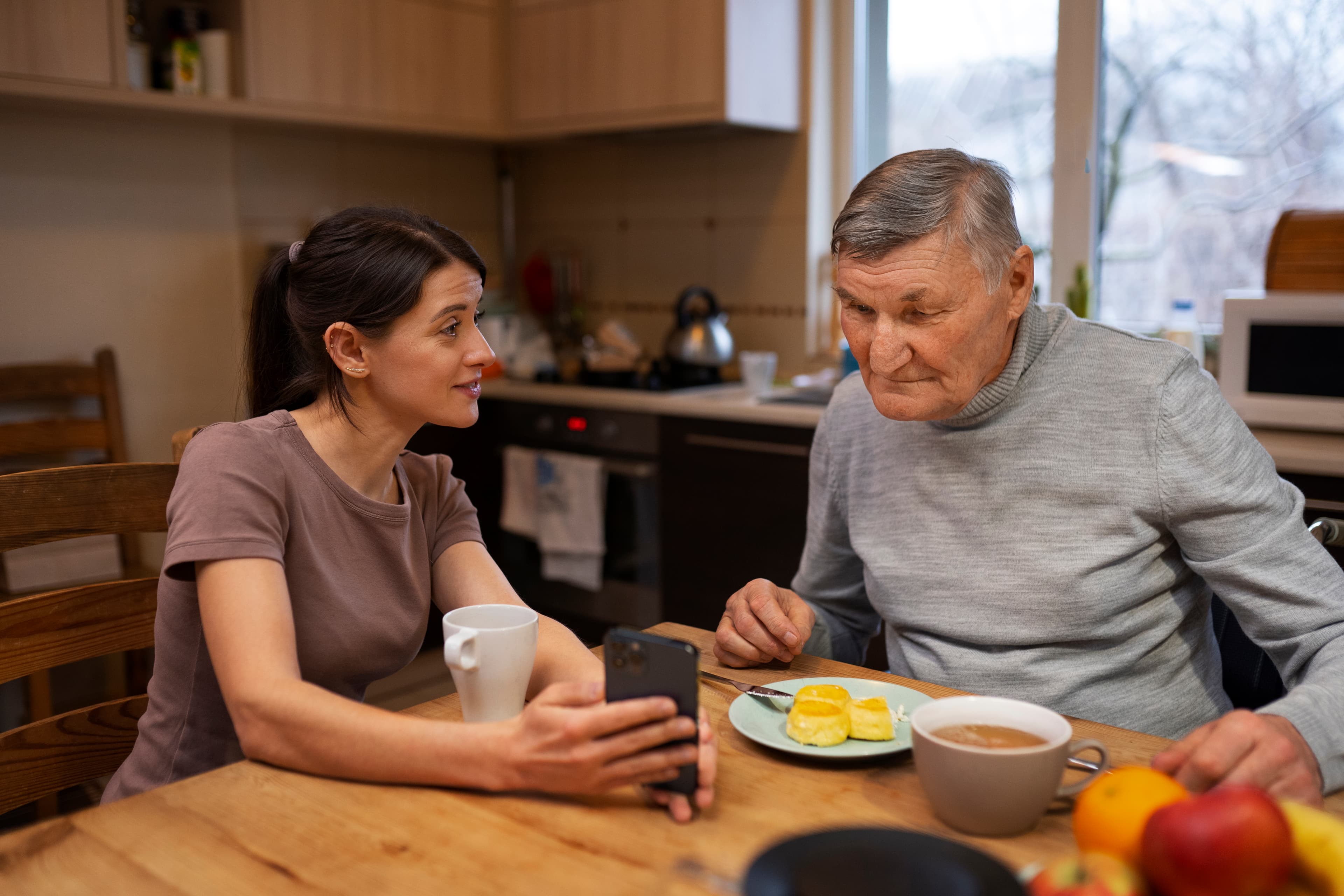 Caregiver connecting with a client at home